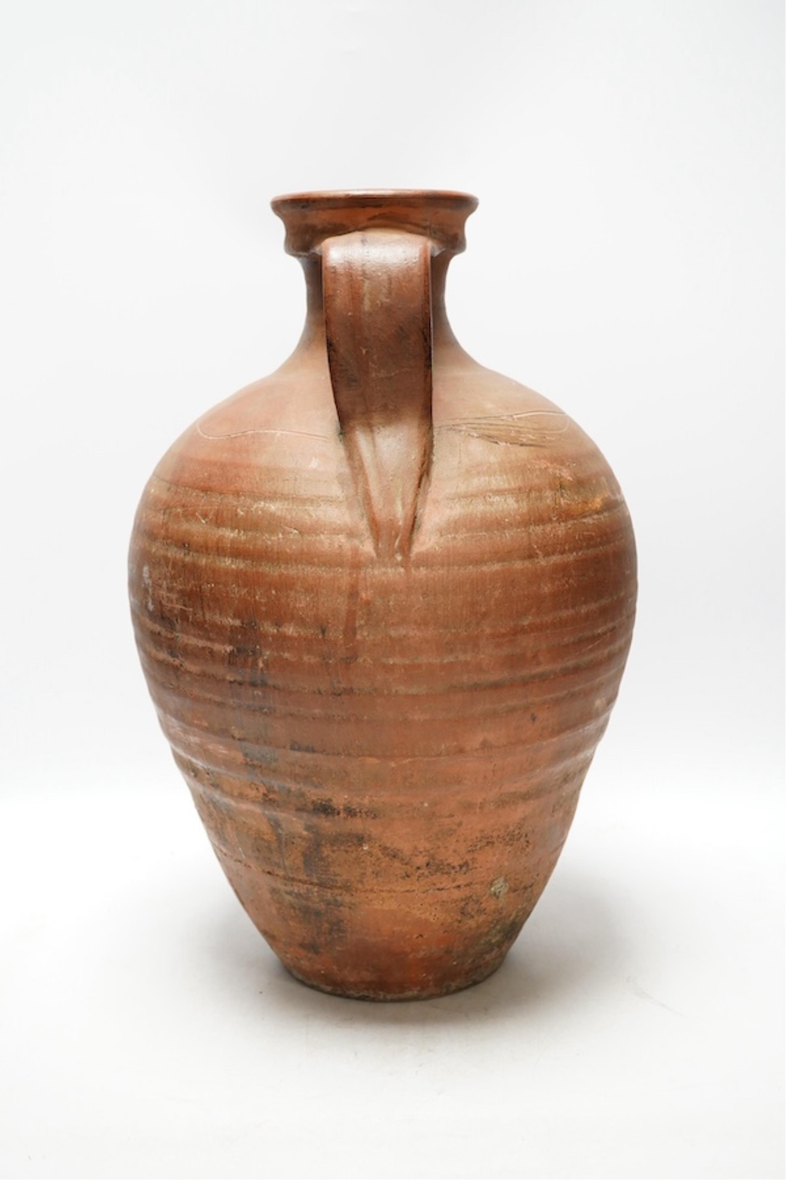 An 18th century Spanish terracotta wine vessel, 42cm. Condition - good